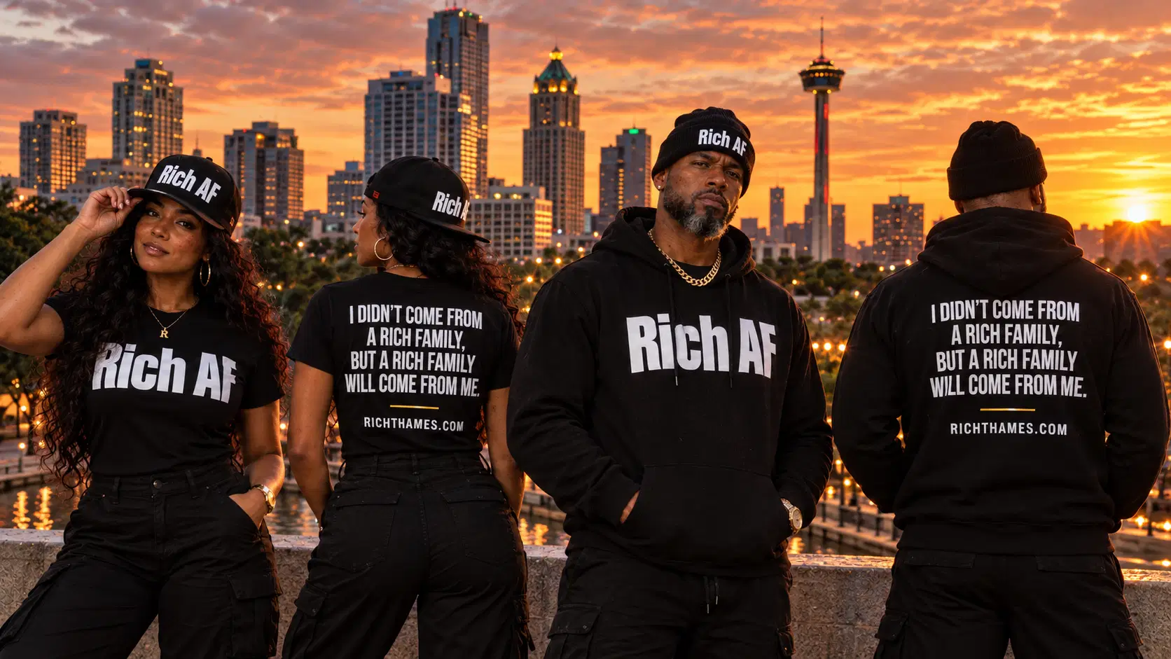 Wear the Vision. Build the Legacy. — Rich AF Generational Wealth Collection — four models in Rich AF black streetwear against the San Antonio skyline at sunset